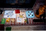 Photo of 9 Wooden Puzzles on Fireplace by Jeremiah Farrell